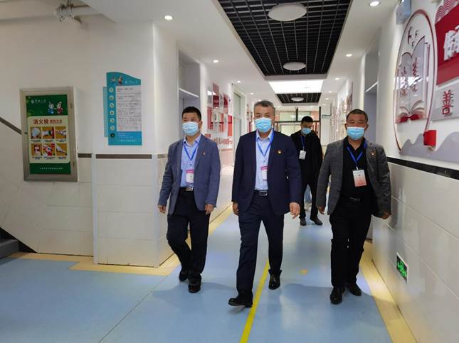 区教育局党工委委员王玉新深入考点考察指导考试组织工作